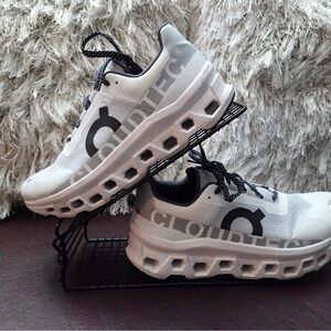 On Men’s Cloudmonster Running Black and White Sneakers